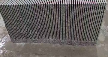 辽宁芝麻白毛板荒料切割