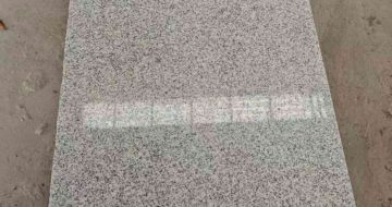 辽宁芝麻白光面毛板